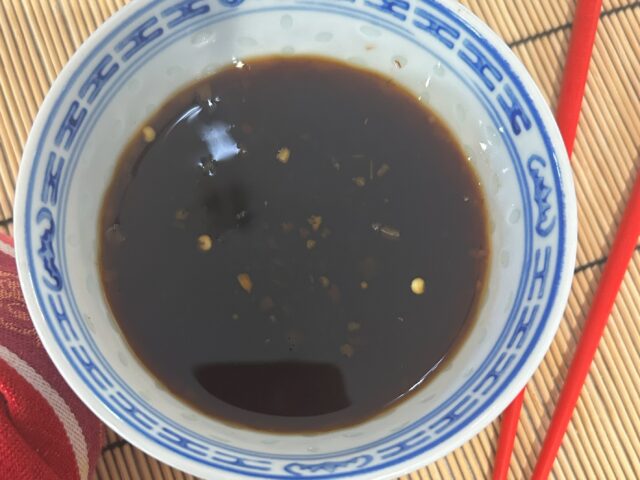 a bowl with salad dressing
