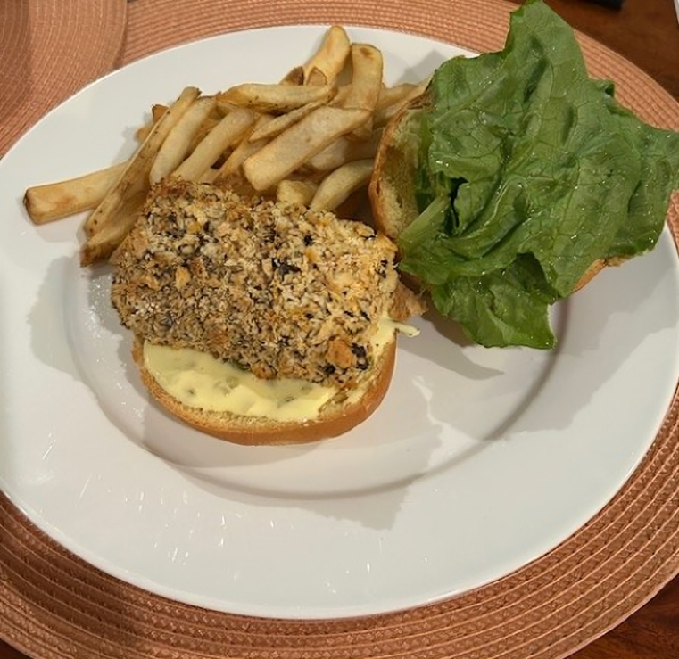 bread, lettuce and fries on a plate