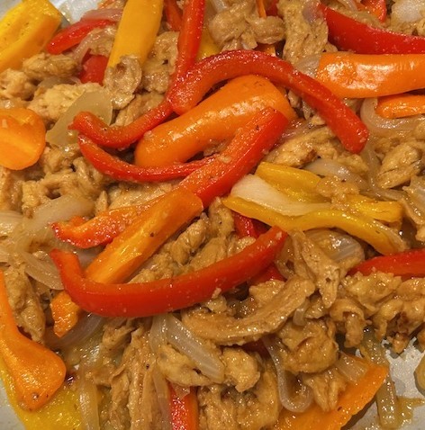 plant-based pepper steak with bell pepper and carrots