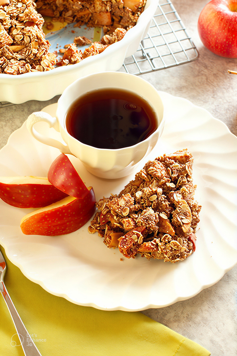 pie on a plate with apple and cup of coffee